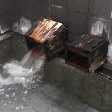 Shimobe Onsen Yukiya hot water spouts in indoor bath