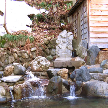 Kaikake Onsen open-air bath hot water spout